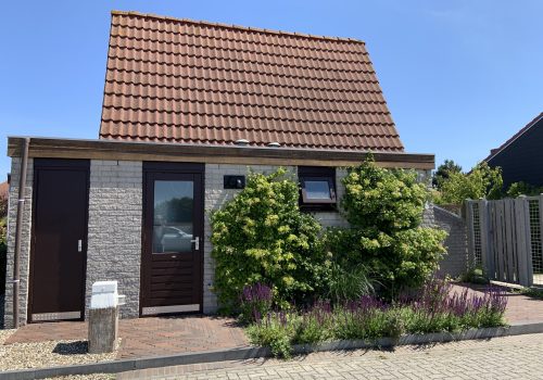 Ferienhaus vom Parkplatz